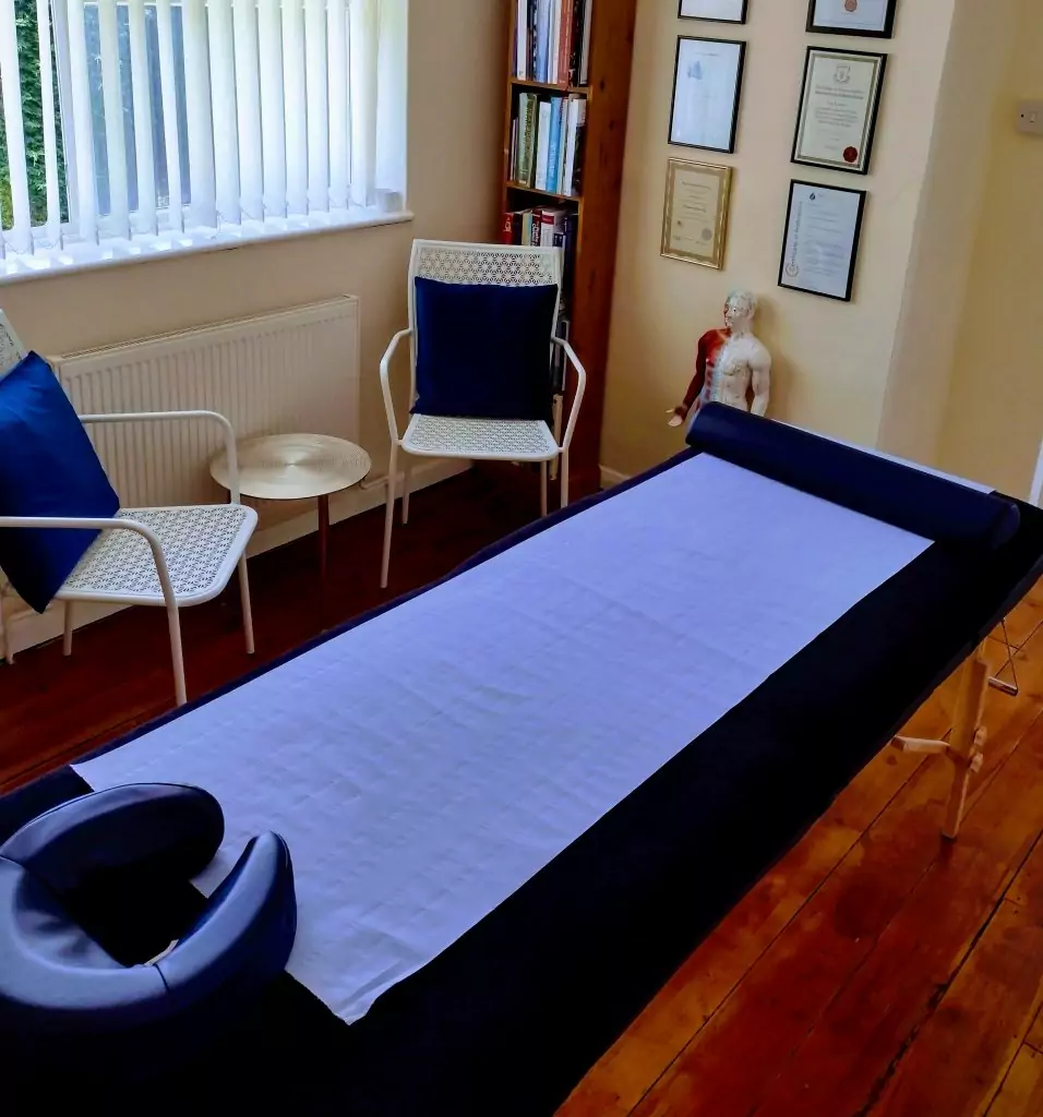 Clinic room with treament couch ready for acupuncture treatment